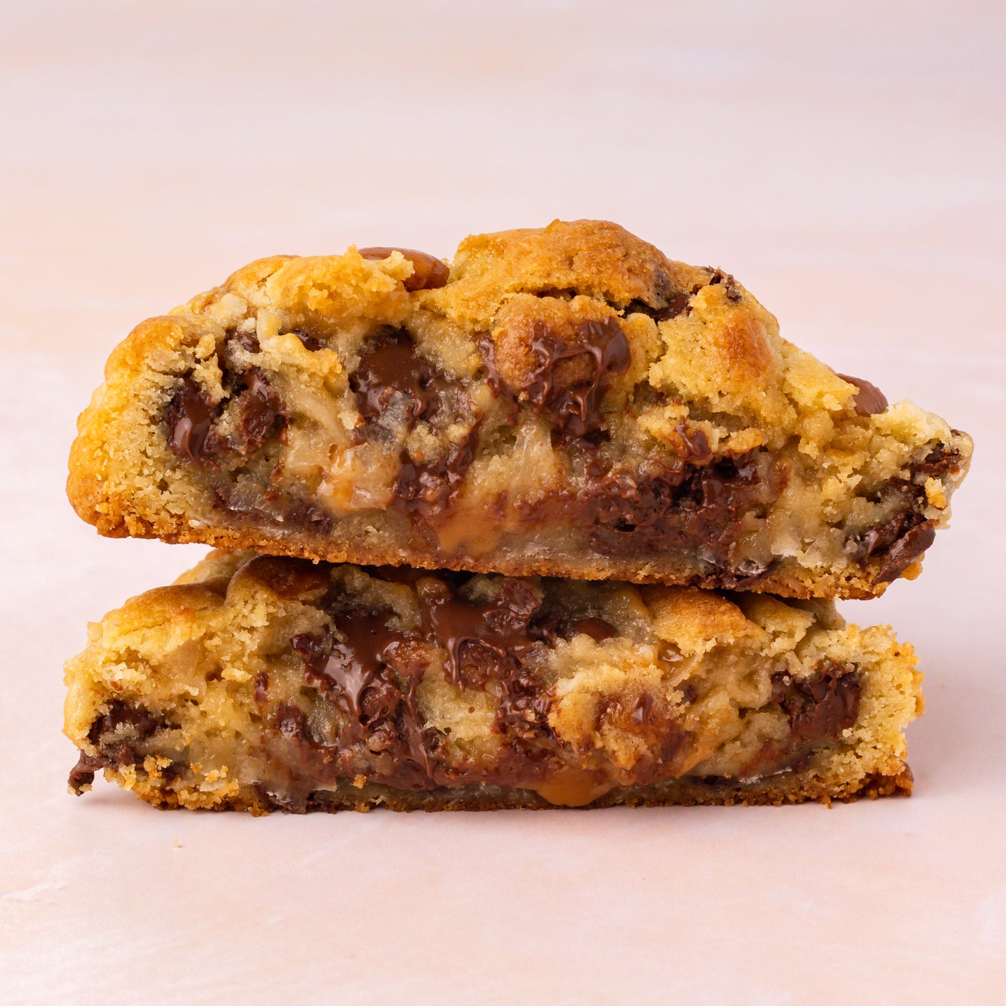 NY Style Caramel Coconut Cookie with golden edges and gooey center