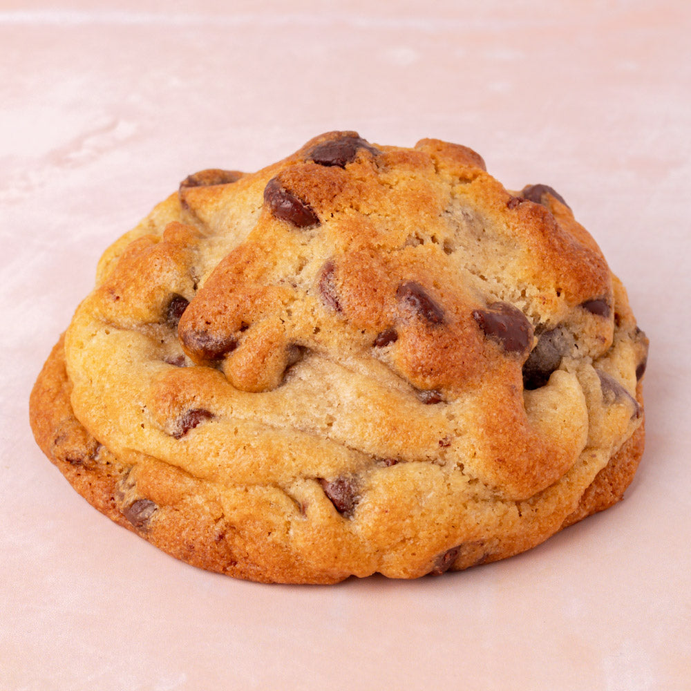 NY Style Chocolate Chip Cookie with golden edges and gooey center