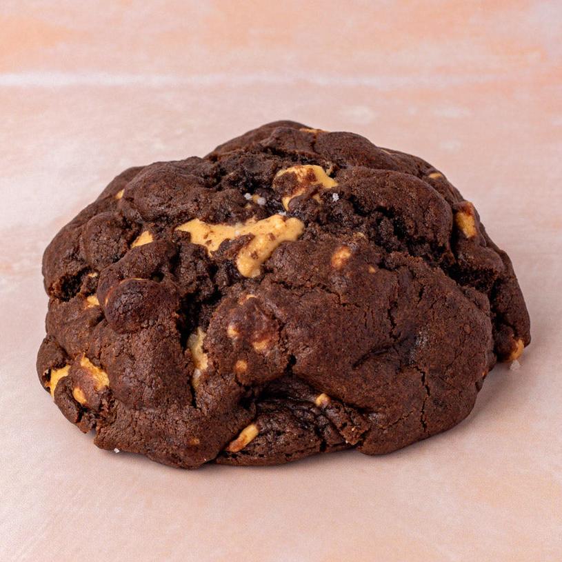 NY Style Chocolate Peanut Butter Cookie with golden edges and gooey center